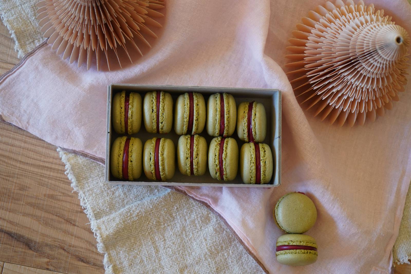 Matcha macarons with berry filling symbolic picture