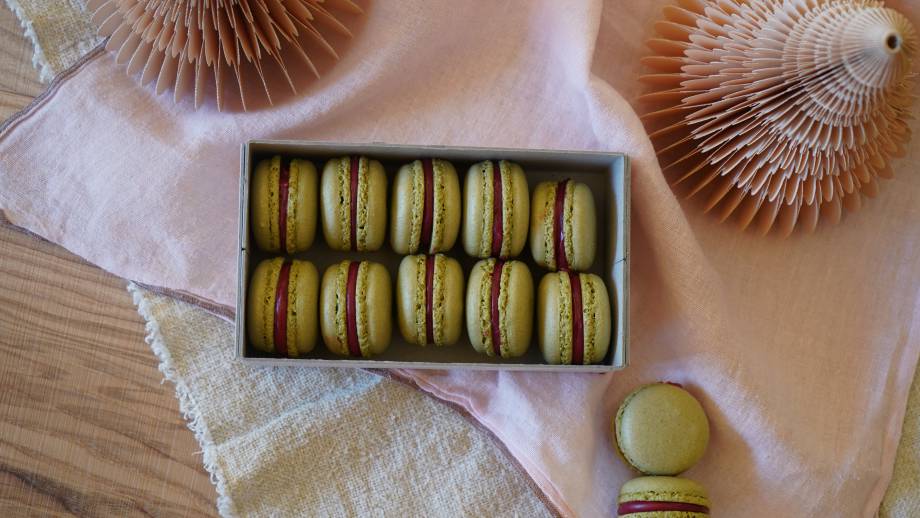 Matcha macarons with berry filling symbolic picture
